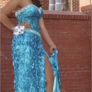 Beautiful Sequin Gown, electric blue shimmer with rhinestone trim.
